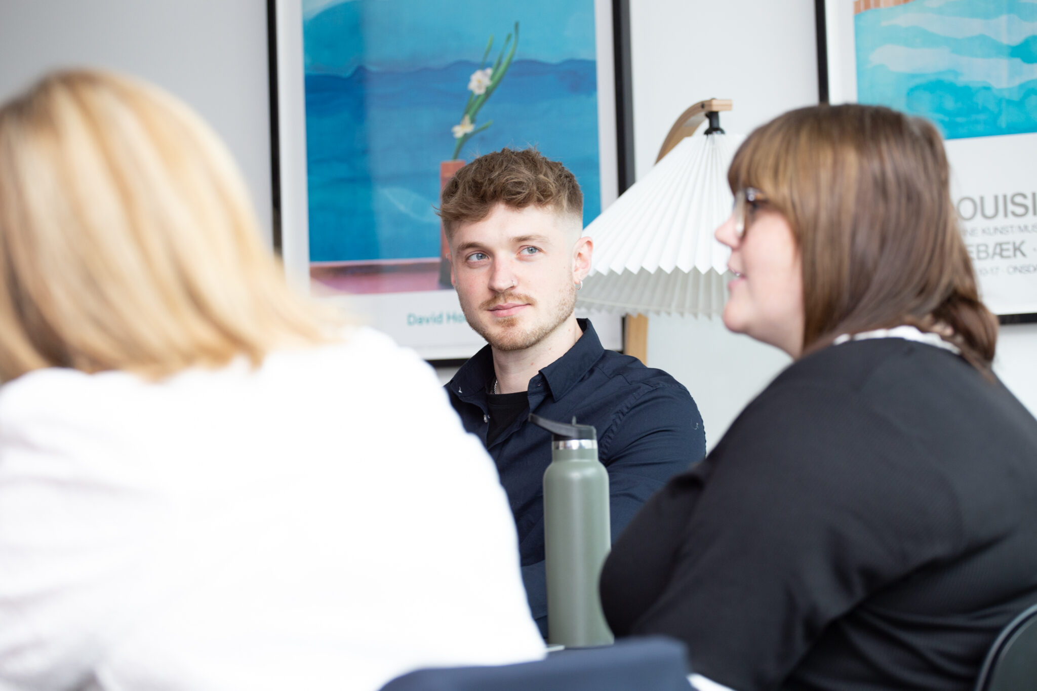 Dominic in a meeting