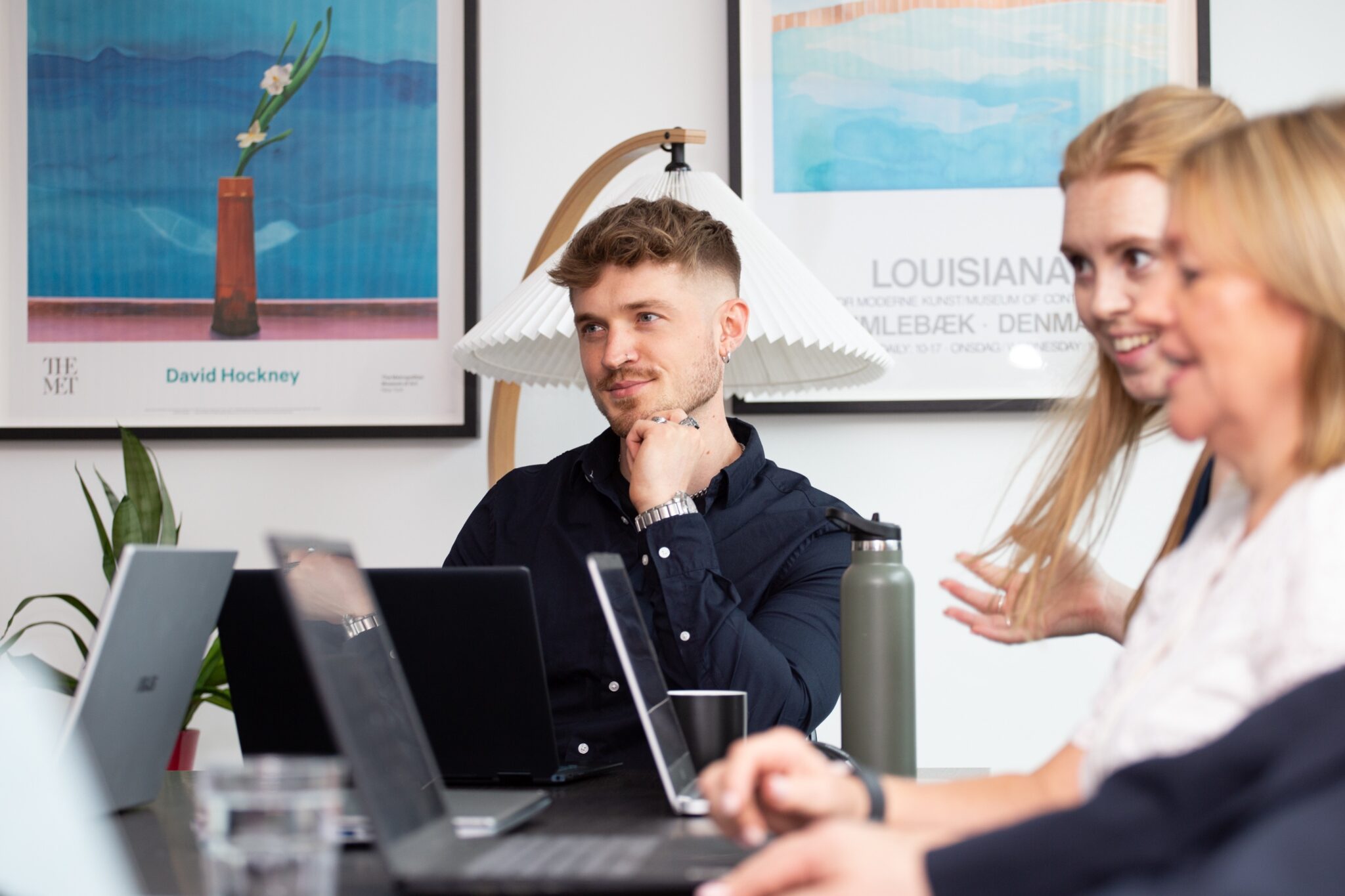 Dominic in a meeting