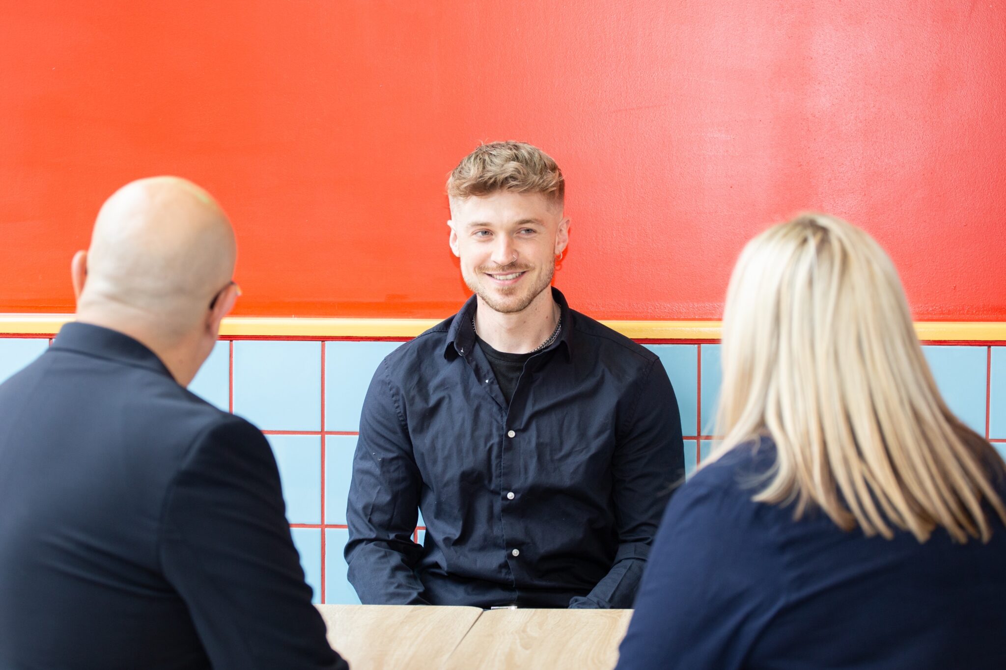 Dominic in a meeting